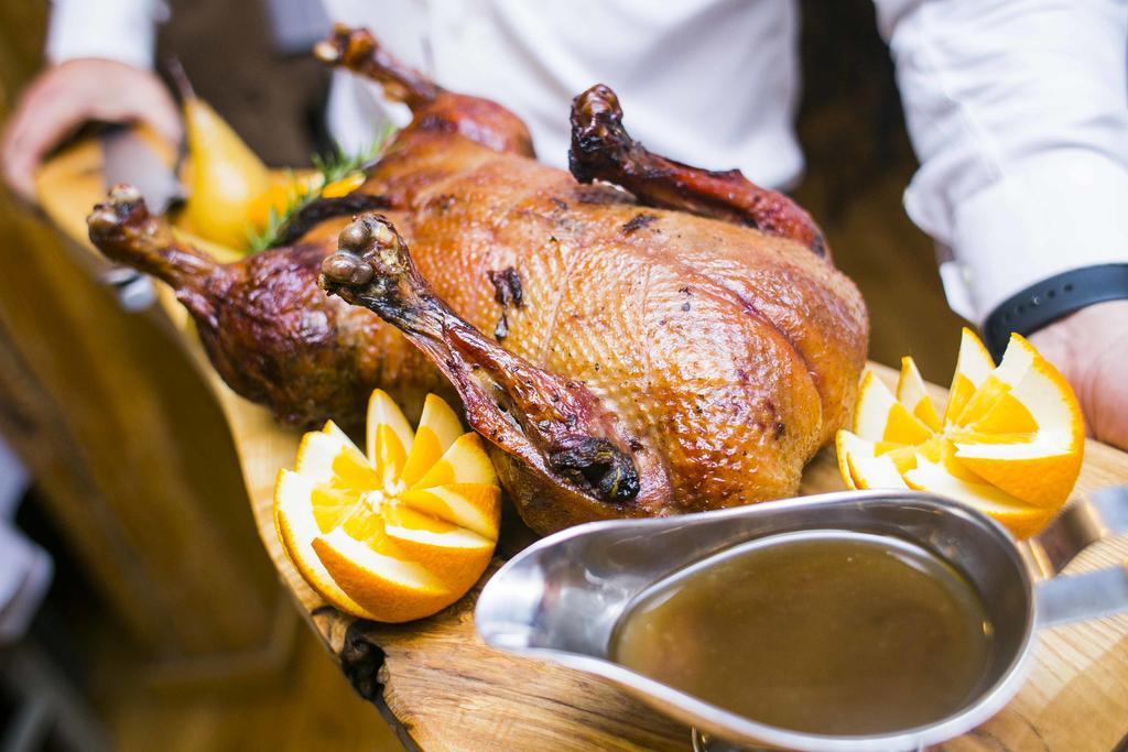 Hotel Gdansk Boutique Exterior foto A roast duck with orange sauce